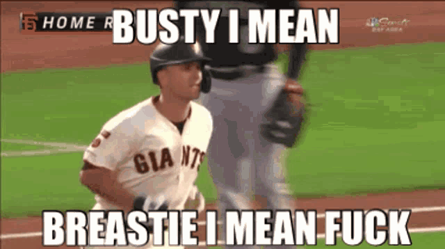a baseball player with a giants jersey on