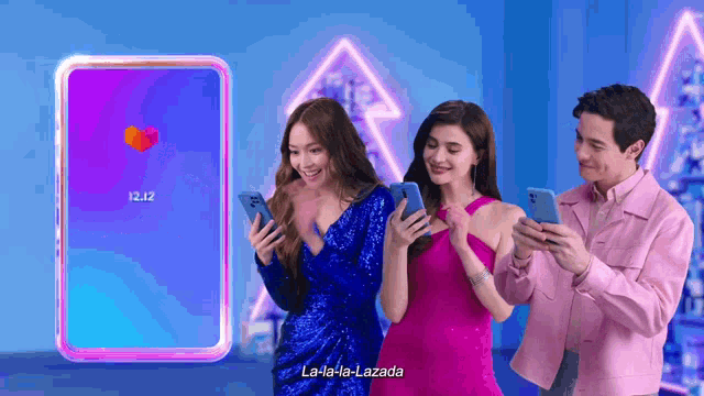 a man and two women are looking at their cell phones with la-la-la-lazada written on the bottom right