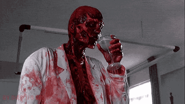 a bloody zombie drinking from a wine glass