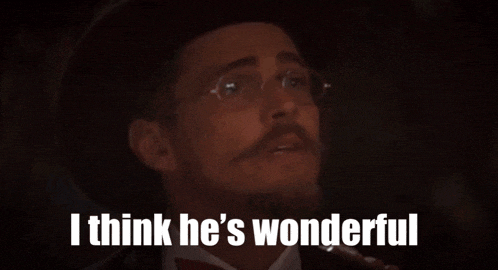 a man with a beard and glasses says i think he 's wonderful