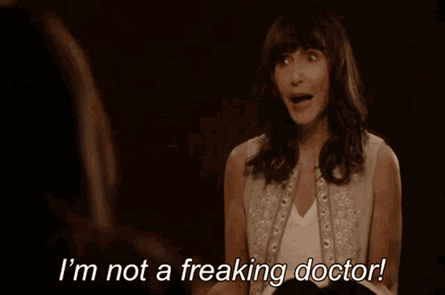 a woman in a white vest says i 'm not a freaking doctor