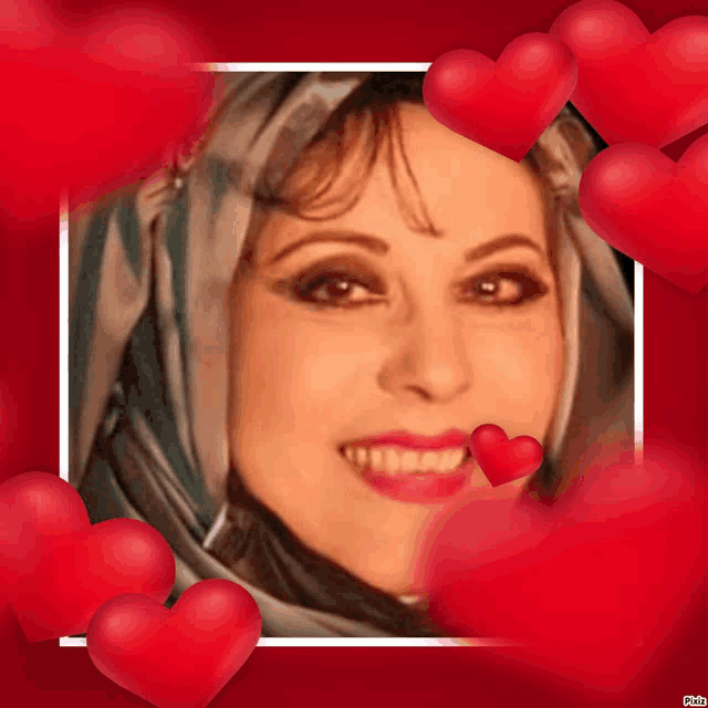 a picture of a woman surrounded by red hearts with the caption " photo "