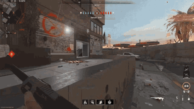 a screenshot of a video game shows a building with graffiti on it and a person holding a gun