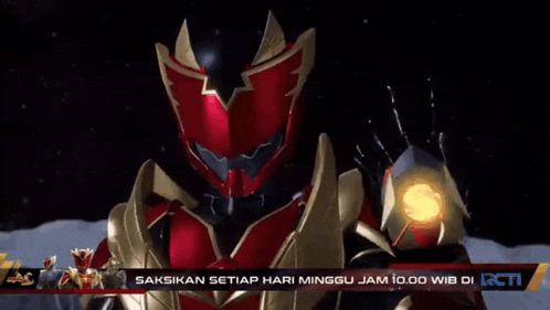 a red and gold superhero is on a tv screen