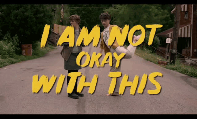 two people standing on a road with the words i am not okay with this