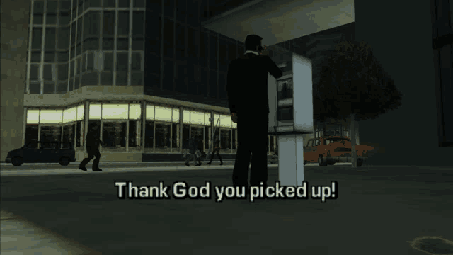a man talking on a payphone with the words thank god you picked up below him