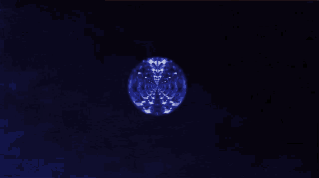 a blue sphere with a butterfly on it