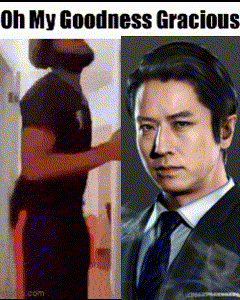 a man in a suit is standing next to a man in a black shirt .