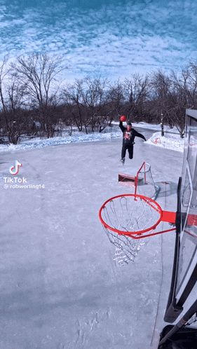 a tiktok video of a person playing basketball on a ice rink