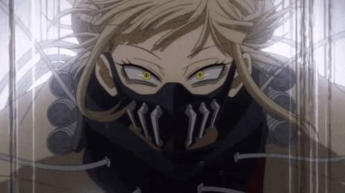 a close up of a person wearing a mask