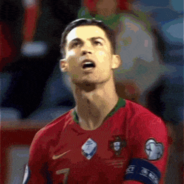 a close up of a soccer player wearing a number 7 jersey