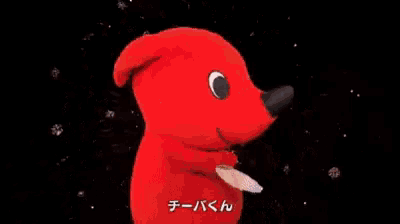 a red stuffed animal is holding a glass of wine in front of fireworks ..
