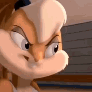 lola bunny from space jam is making a funny face .