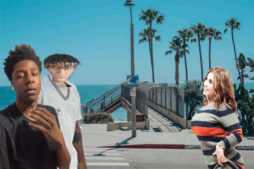 a man and a woman are standing in front of a no parking sign