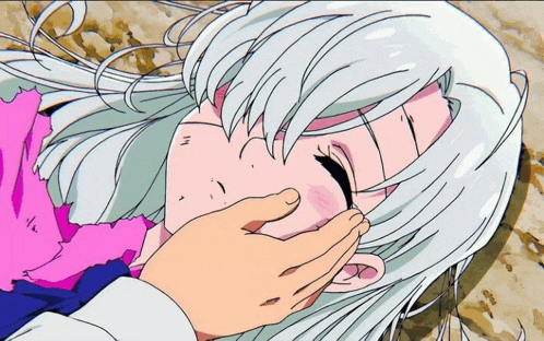 a person touching a girl 's face with a pink scarf around her neck
