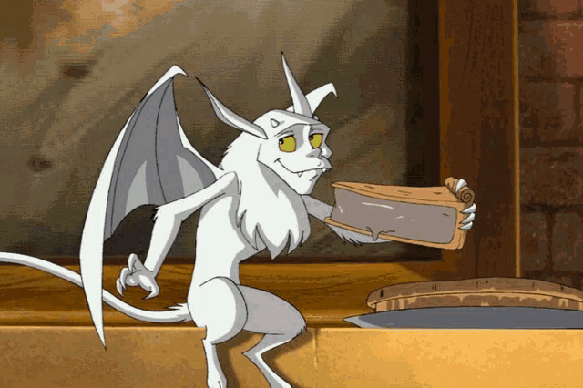 a cartoon drawing of a gargoyle holding a piece of cake