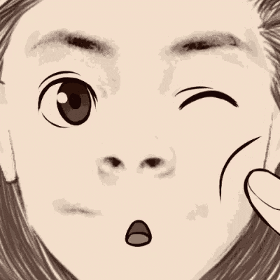 a close up of a person 's face with a surprised expression on it .