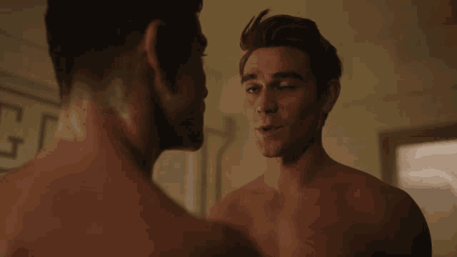 two shirtless men are looking at each other with the words we 'll see about that