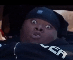 a man wearing a black beanie and a black sweatshirt with the word ver on it