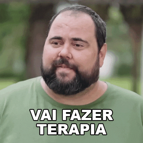 a man with a beard is wearing a green shirt that says " vai fazer terapia "