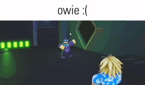 a person in a blue shirt is standing in a dark room with the words owie written above them