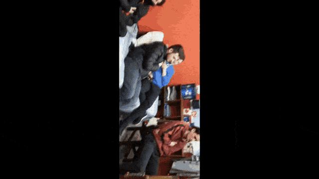 a group of people are sitting in a circle with their feet crossed