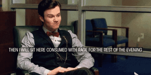 a man in a suit and bow tie is sitting in a chair with the words then i will sit here consumed
