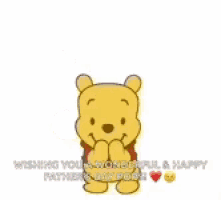 winnie the pooh is holding a pink heart above his head and wishing you a wonderful and happy father 's day .
