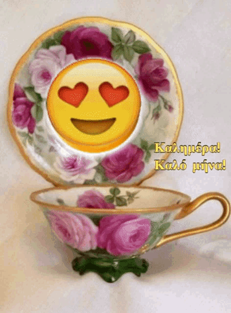 a smiley face with hearts in its eyes is on a saucer and cup