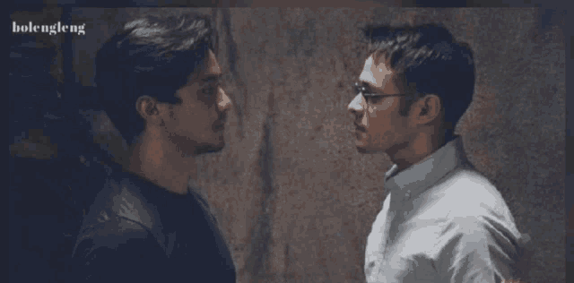 two men looking at each other with the word holengleng on the bottom left