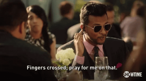 F Ingers Crossed Agent GIF - F Ingers Crossed Agent Pray For Me GIFs