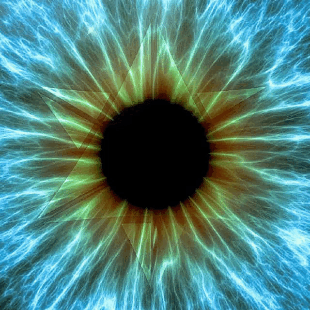 a blue and green eye with a black center