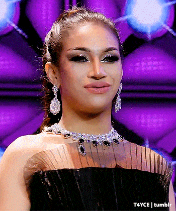 a close up of a woman wearing a necklace and earrings with t4yce tumblr in the corner