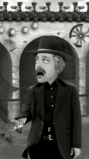a man in a suit and top hat is holding a gun in front of arches .