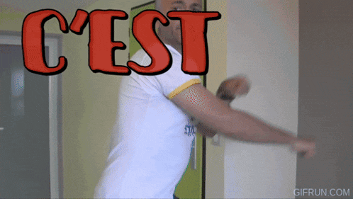 a man in a white shirt with the word c'est above him