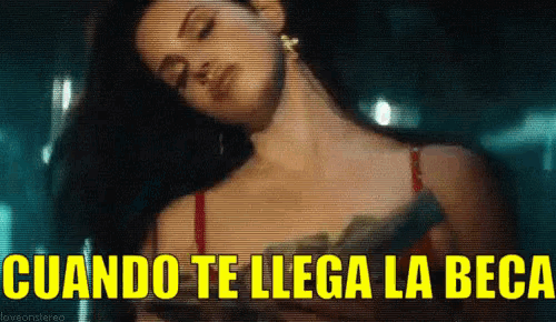 a woman in a red top is holding a bottle of wine and the words cuando te llega la beca are written above her