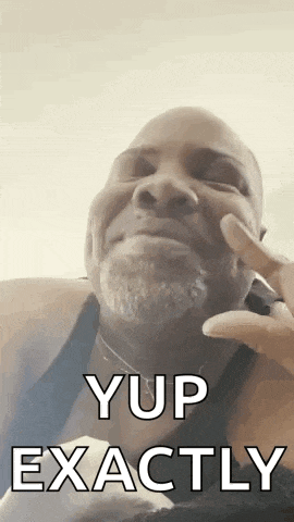 a man with a beard is making a face and says yup exactly