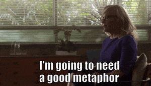 a woman is sitting in front of a window and says " i 'm going to need a good metaphor " .