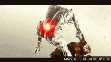 a statue of a man with a red light coming out of his back .