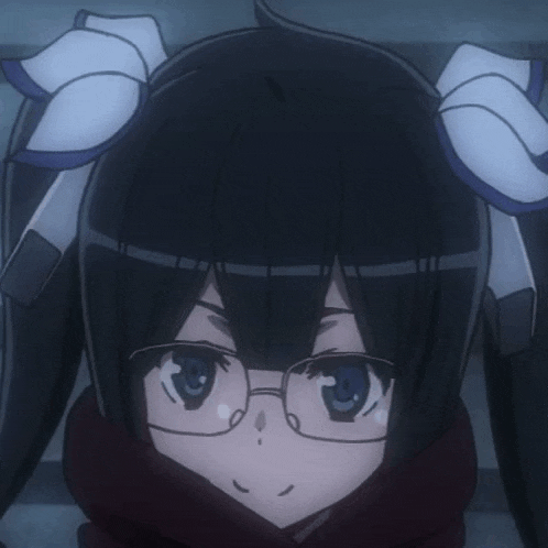 a close up of a girl wearing glasses and a red scarf