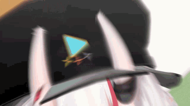 a close up of a cartoon character wearing a hat .