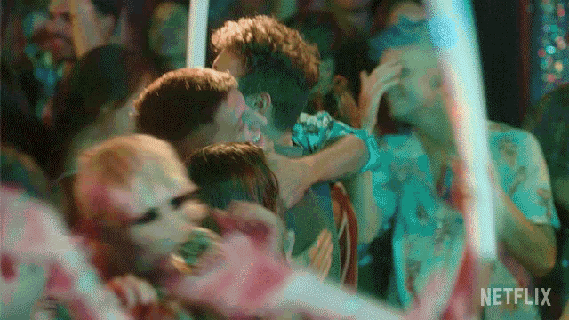 a netflix ad shows a crowd of people dancing in a club