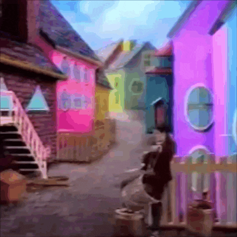 a cartoon drawing of a street with colorful buildings and stairs
