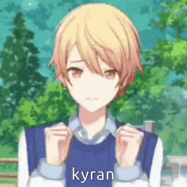 a young boy with blonde hair is wearing a blue sweater and a blue shirt .