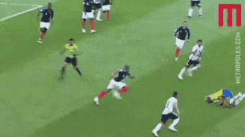 a soccer game is being played on a field with a watermark that says metlife on it
