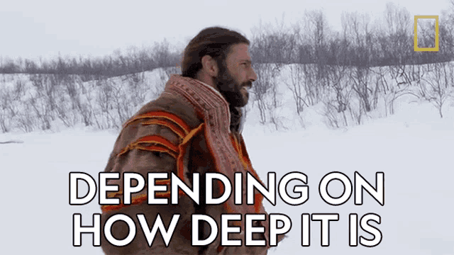 a man standing in the snow with the words depending on how deep it is