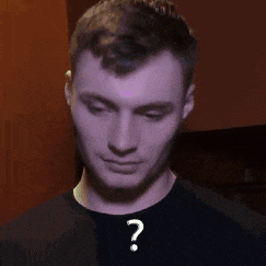 a man with a question mark on his forehead .