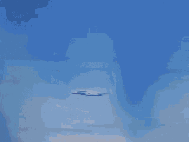 a cartoon character named goku is swimming in a body of water