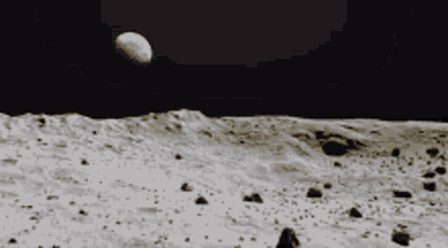 a black and white photo of the moon taken from the surface of the moon