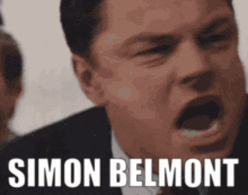 a man in a suit and tie is making a funny face with his mouth open and the name simon belmont written on the bottom